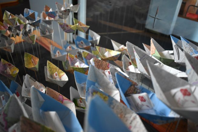 An image of paper boats made by Chinese children, on display at Chelmsford Theatres